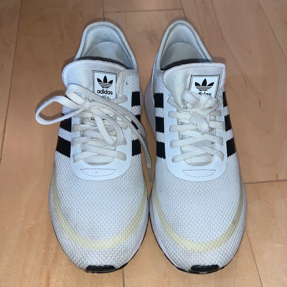 women’s/kids adidas running shoes. Size 6 but could fit a women’s size 7-7.5
